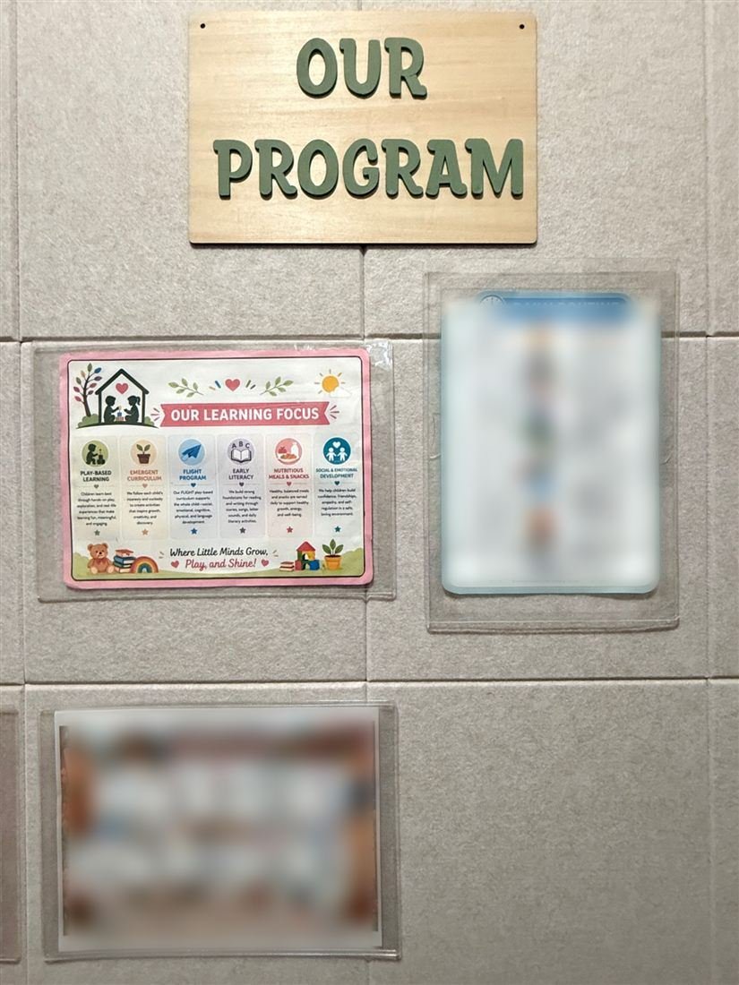 The Our Program board showing Our Learning Focus, the Daily Routine and a weekly programming template